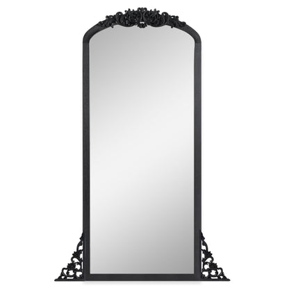 Miroir de sol sculpté en bois massif de forme arquée sur toute la longueur