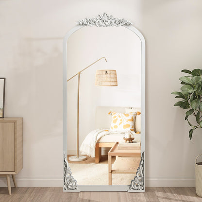 Miroir de sol sculpté en bois massif de forme arquée sur toute la longueur