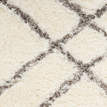 Tapis Nourison luxueux à poils longs et ultra moelleux, motif géométrique abstrait