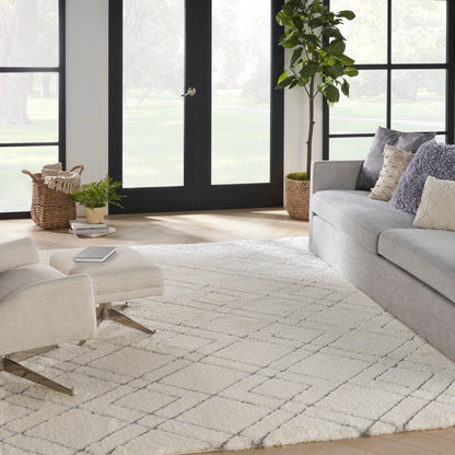 Tapis Nourison luxueux à poils longs et ultra moelleux, motif géométrique abstrait